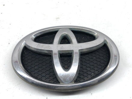 ZNAK / EMBLÉM PREDNÝ TOYOTA YARIS (_P9_) 2005 - 2014 75311-0D030