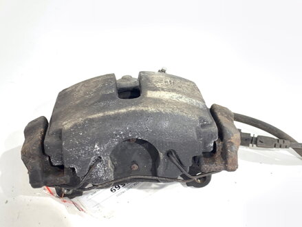 Brzdový strmeň ľavý predný VW Passat B7 Variant (365) 2010 - 2015