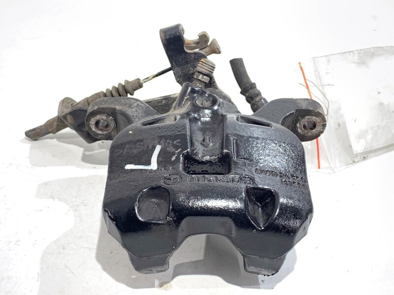 Brzdový strmeň ľavý zadný Mazda 3 (BM, BN) 2013 - 2022