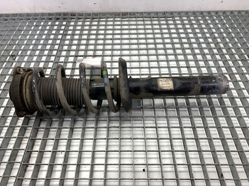 Tlmič pravý predný S pružinou VW Passat B7 (362) 2010 - 2015