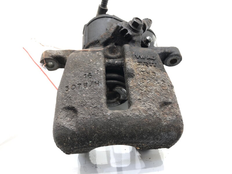 Brzdový strmeň ľavý zadný VW Passat B7 Variant (365) 2010 - 2015